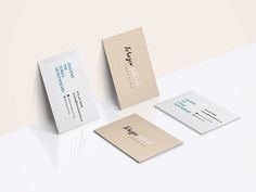 three business cards on top of each other