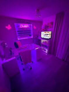 the room is lit up with purple lighting and pink curtains on the window sill