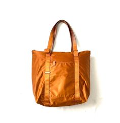 "Up for sale is a vintage BRIC's tan coloured nylon and leather tote bag as shown in the pictures. The bag has been used and is generally in good condition. It has general wear and tear like small blemishes around the corners and bottom and the inside has some small stains. The body of the bag measures approx 17\" wide and 17\" tall (the bag is approx 27\" in height if you include the handles)" Large Capacity Brown Nylon Bag, Brown Nylon Double Handle Shoulder Bag, Brown Nylon Shoulder Bag With Double Handle, Brown Nylon Shoulder Bag For Daily Use, Nylon Shoulder Bag For Travel, Nylon Travel Tote Bag With Adjustable Strap, Functional Brown Shoulder Bag For Shopping, Brown Nylon Shopping Bag, Nylon Satchel Shoulder Bag For Travel