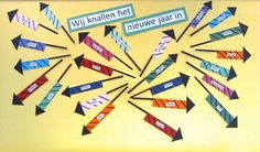 a bulletin board with different colored arrows and words written in german on yellow paper background