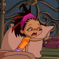 an animated image of a person in bed with a telephone