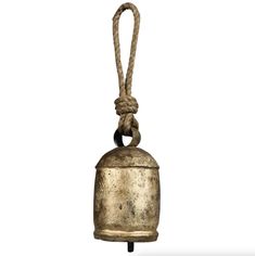 an old brass bell hanging from a rope