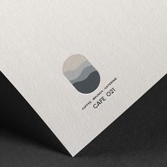 the logo for cafe oi is shown on top of a piece of white paper