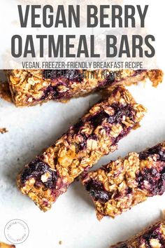 vegan berry oatmeal bars stacked on top of each other with text overlay