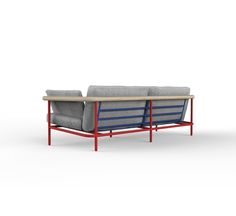 a couch with two seats and a table on it