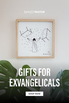 a white wall with the words gifts for exanangelicas on it and a plant