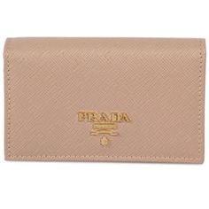 This Prada saffiano beige card holder wallet is the perfect size for your personal necessities. The gold Prada Milano logo looks amazing with the beige saffiano leather. Includes authenticity cards and Prada box.     Model: 1MC122  Cammeo beige saffiano leather   Gold-tone hardware  Gold Prada Milano logo   Snap closure  Three card slots  Measurements: 4.5" x 1" x 2.5"  (LWH)  Includes authenticity cards and Prada box   Made in Italy Classic Gold Wallet With Logo Plaque, Formal Gold Wallets With Logo Plaque, Gold Leather Wallet With Logo Plaque, Luxury Gold Wallets With Logo Plaque, Designer Gold Wallet With Card Slots, Designer Gold Wallets With Card Slots, Luxury Gold Wallet With Rfid Blocking, Elegant Gold Wallet With Rfid Blocking, Elegant Gold Card Holder For Travel