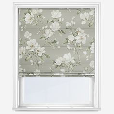 a roman blind with white flowers on it