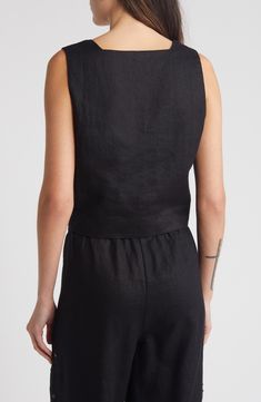 This lightweight linen tank top features a modern square neck, wide shoulder straps and an on-trend cropped hem. 18 1/2" length (size Medium) Square neck Lined 100% linen Dry clean Imported Elegant Cropped Linen Crop Top, Elegant Linen Cropped Top, Chic Linen Crop Top, Chic Cropped Linen Tops, Chic Fitted Linen Tank Top, Elegant Linen Crop Top For Summer, Chic Linen Tank Top, Fitted Linen Crop Tank Top, Chic Sleeveless Linen Crop Top