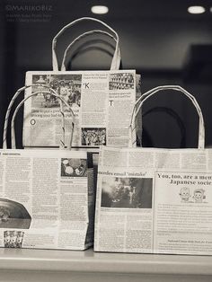 several newspaper bags stacked on top of each other