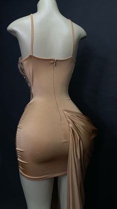 PRODUCT DESCRIPTION: A concept dress: Corset cups dress with an attached side skirt  MATERIAL/COLOR: Light copper SPANDEX with nude copper colored RHINESTONES. Has mesh on the "invisible part of the corset. FIT OF PRODUCT: True to size Champagne Party Dress With Corset Back, Elegant Gold Dress With Corset Back, Brown Fitted Evening Dress For Party, Fitted Brown Evening Dress For Party, Elegant Gold Corset Dress For Party, Brown Backless Party Dress, Brown Spaghetti Strap Evening Dress, Gold Evening Dress With Boned Bodice, Fitted Champagne Mini Dress For Evening