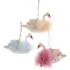 three swan ornaments hanging from chains on a white background