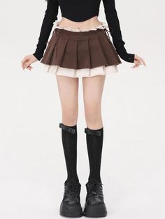 Inject an edgy vibe into your outfit with this brown, tiered mini skirt. Highlighting distressed elements and neat pleats, it's a mid-rise polyester masterpiece with nifty side zip and drawstring embellishments. Ideal for creating a bold, fashion-forward look. Distressed details Pleated Tiered design Polyester Mid rise Zip fastening at side Drawstring at side The product is manufactured slightly smaller than usual, please check the size chart before ordering. Jeans Patchwork, Corset Bustier, Fall Sweaters For Women, Vintage Preppy, Skirt Y2k, Tiered Mini Skirt, Denim Hoodie, Jogger Pants Casual, Bubble Skirt