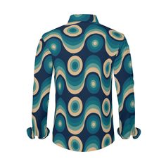 Immerse yourself in the nostalgic charm of the 60s and 70s with our Retro Shirt in Teal, a meticulously designed Men's Vintage Style Shirt that captures the essence of Mod and Mid Century Modern fashion. This Geometric Shirt for Men is a timeless piece that effortlessly blends the iconic styles of the 60s and 70s.With its distinctive teal hue, long sleeves, and geometric pattern, this Vintage Style Shirt offers a perfect homage to the fashion of the era. Crafted from 100% polyester, it ensures b Cotton Retro Shirt With Retro Print, Retro Fitted Printed Shirt, Retro Collared Top With Retro Print, Cotton Shirt With Retro Print, Fitted Retro Printed Shirt, Retro Long Sleeve Cotton Shirt, Retro Fitted Shirt With Vintage Print, Retro Collared Shirt With Vintage Print, Retro Printed Collared Top