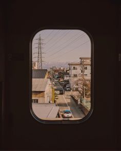 looking out the window at an urban street