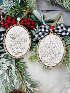 two christmas ornament hanging from a tree with pine cones and plaid ribbon on it