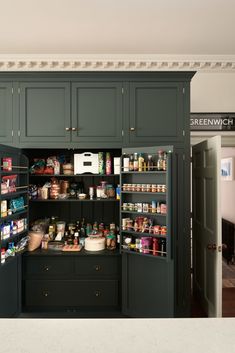 an open pantry with lots of food in it