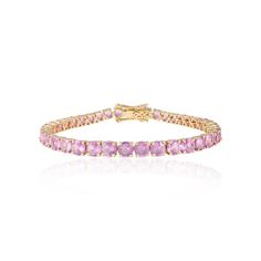 This is part of Chairish’s Fine Jewelry assortment.  This Brilliant Pink Sapphire Tennis Bracelet in 14K gold showcases 14.83 carat endlessly sparkling natural pink sapphire. It measures 7 inches long in length.  Sapphire stimulates concentration and reduces stress.  Designed with perfect round cut pink sapphire to make you stand out on any occasion or event. The elegant style complements the attire beautifully and is a perfect Engagement Gift, Bridal Shower Gift, Sister Gift, Gift For Sister, M Formal Pink Gemstone Tennis Bracelet, Luxury Pink Gemstone Tennis Bracelet, Pink Tennis Bracelet With 17 Jewels For Wedding, Pink Tennis Bracelet For Formal Wear, Luxury Pink Tennis Bracelet For Wedding, Romantic Energy, Sapphire Tennis Bracelet, Louis Vuitton Bracelet, Perfect Engagement Gifts