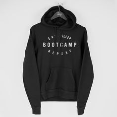 A top quality "Eat Sleep Bootcamp Repeat" Hoodie - a perfect Bootcamp gift! Each hoodie printed to order using the latest in DTG printing technology with durable inks onto the finest blended hoodies made from ethically grown US cotton. Perfectly packaged and delivered promptly to you or your chosen recipients door. --- Sizing ---- For sizing information please see the detailed size guide within the listings images. --- Delivery Times --- Printed and shipped from within the USA Please see the est Winter Outdoor Hoodie With Logo Print, Outdoor Hoodie Sweatshirt With Logo Print, Hoodie Sweatshirt With Logo Print For Outdoor, Logo Print Hoodie Sweatshirt For Outdoor, Sporty Outdoor Hoodie With Logo Print, Hooded Sweatshirt With Letter Print For Camping, Casual Camping Hoodie With Drawstring Hood, Hooded Letter Print Sweatshirt For Camping, Casual Hoodie With Drawstring For Camping