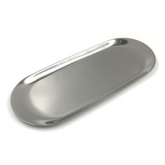 an oval metal tray on a white background