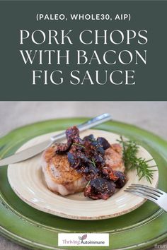 pork chops with bacon and fig sauce on a green plate next to a fork