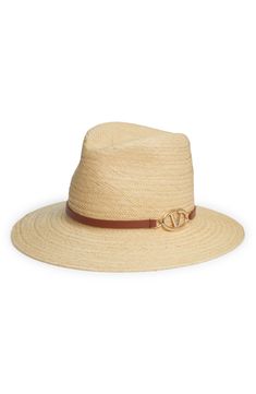 Oval VLOGO hardware anchors the calfskin-leather strap of a straw panama hat designed with a pinched crown and flat brim. Straw with leather trim Spot clean Made in Italy Designer Visor Hats For Travel, Designer Adjustable Hats For Travel, Designer Visor Hats For Spring, Luxury Panama Hat For Spring, Luxury Travel Visor Hat, Luxury Flat Brim Straw Hat For Summer, Luxury Straw Hat For Spring Vacation, Luxury Travel Hat For Spring, Luxury Spring Travel Hat