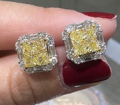 Fancy yellow diamond stud earrings prove the age-old saying "Diamonds are a girl's best friend". Totaling 3.03carats of delicious pleasure. Metal: 18K Two-Tone GoldDiamond Shape: Brilliant Round / Cushion CutDiamond Weight: Fancy Yellow 1.66ct tw, 24 round brilliant 1.37ct twDimensions: 11mm x 11mm Canary Yellow Diamonds, Fancy Yellow Diamond, Round Cushion, Canary Yellow, Diamond Stud Earrings, Diamond Stud, Yellow Diamond, Girls Best Friend, Diamond Earrings Studs