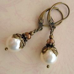 Pearl Dangle Earrings Antiqued Brass 9mm Cream by CloudCapJewelry Elegant Copper Beaded Earrings, Vintage Bronze Beaded Earrings, Vintage Beaded Bronze Earrings, Vintage Bronze Round Bead Earrings, Vintage Bronze Earrings With Round Beads, Handmade Vintage Pearl Earrings, Elegant Bronze Round Bead Earrings, Elegant Bronze Round Beaded Earrings, Victorian Earrings