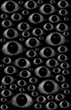 black and white photograph of many eyes