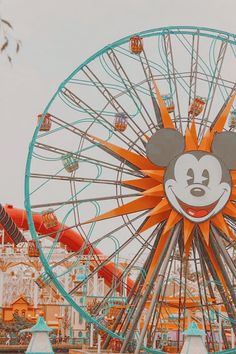 a ferris wheel with a mickey mouse face on it