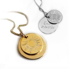 Discover this magical necklace that consists of two pendants: a smaller one that bears a bright sun motif and a larger one that you can have engraved according to your wishes. The small pendant partially covers the engraving and thus provides a unique look. The necklace is available in silver as well as in a gold plated version and comes in a stylish gift box.  Pendant Diameter: approx. 1.2 cm and 1.5 cm  Material: 925 silver (partially rhodium-plated) or gold plated 925 silver  Chain length: approx. 40 cm, 45 cm or  50 cm Material of the necklace: 925 silver or gold plated 925 silver  ENGRAVING: In the center of the pendant: max. 9 characters in a line (up of up to 3 lines) Engraving technique: diamond engraving  This personalized necklace is the ideal gift to bring joy and a touch of sun Silver Necklace With Sun Design As A Gift, Silver Sun Design Necklace For Gift, Silver Necklace With Sun Design For Gift, Yellow Gold Charm Necklaces With Sun And Moon Design, Gift Necklace With Sun And Moon Round Pendant, Gift Necklace With Sun And Moon Design, Sterling Silver Necklace With Yellow Gold Sun Design, Silver Sun Design Jewelry As A Gift, Sun And Moon Design Round Pendant Necklace For Gift