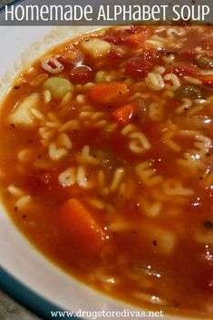 a bowl of soup with rice and vegetables