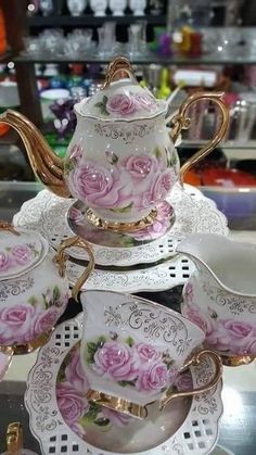 tea set with pink roses and gold trimmings