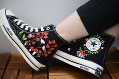 Custom embroidery converse sneakers/ Mushroom,flower  embroidered shoes/Custom converse high tops embroidered /Mushroom embroidered sneakers  💸 Price includes Converse Shoes and floral embroidery as shown 🌸 You can send me your Converse/Vans shoes or I can buy them for you. We stock all the Converse and Vans shoes you want, if you want other Converse/Vans shoes in the store, please message us. Your embroidered Converse/Vans shoes will be available for shipping in 7-15 days. 🌸 I started hand embroidering on fashionable clothes and handbags over 20 years ago - and now on CONVERSE/VANS shoes, an American icon, a must-see classic! I'm excited to give your Chuck Taylor shoes a new look with beautiful, nature-inspired embroidery. All images, designs and text used by CUSTOMSHOEDESIGNSOHO are c Casual Sneakers With Custom Embroidery, Casual Custom Embroidery Lace-up Sneakers, Casual High-top Sneakers With Custom Embroidery, Black High-top Sneakers With Floral Embroidery, Casual Sneakers With Custom Embroidery For Spring, High-top Multicolor Embroidered Sneakers, High-top Embroidered Multicolor Sneakers, Spring High-top Sneakers With Embroidered Logo, Casual High-top Sneakers With Embroidered Graphics