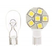 the light bulb is white and has two small lights on each side, one with yellow bulbs