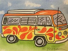 an orange and white van with flames painted on it