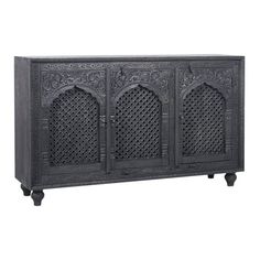 an ornate black cabinet with four doors