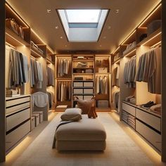 a large walk in closet with lots of drawers and clothes hanging on the walls,