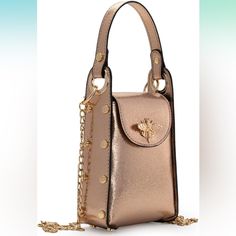 Nwt Rose Gold Shimmer Cellphone Crossbody Purse With Gold Chain Strap. Has A Lift The Flip Snap Button Closure With Bee Decor And Gold Studs. Has A Single Compartment Inside And Credit Card Slots. Measures 5.2″ X 6.5″ X 2.5″. Great Size To Carry All Necessary Essentials. Classic Crossbody Wallet On Chain With Gold-tone Hardware, Elegant Crossbody Bag Strap With Gold-tone Hardware, Hand Painted Leather Bag, Crossbody Bag With Gold-tone Hardware, Travel Phone Bag With Chain Strap, Crossbody, Painted Leather Bag, Luxury Crossbody Wallet On Chain With Gold-tone Hardware, Fringe Crossbody Bag, Crossover Bags