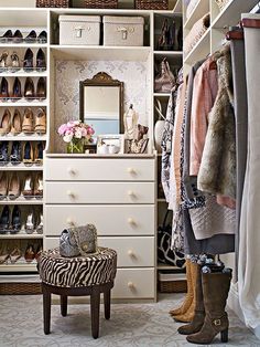 the closet is full of shoes and purses