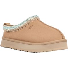 The UGG Tazz for kids is the perfect clog you've been searching for. With a platform outsole for a trendy lift and a sturdy step-in feel, it’s both stylish and practical. The ultra-soft UGGplush lining and insole provide dreamy, moisture-wicking comfort for little feet. The playful UGGbraid detail adds a unique touch only UGG can offer. Match their style with the adult version for a fun mini-me moment. If they love the Tasman, they'll definitely adore the Tazz. These UGG Taz Sand Suede Kids' Sli Tazz Slipper, Ugg Tazz, Ugg Kids, Preppy Shoes, Ugg Tasman, Clog Slippers, Kids Slippers, Ugg Slippers, Kids Uggs