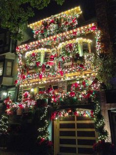 a house covered in christmas lights and decorations