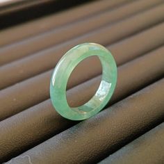 Size:6 3/4US （Inside Diameter:17.2MM） Width:4.8MM  Thick:3.1MM  Weight: 2.57g  Packing:Gift Box ( Certificate included ) The ring color changes depending on the light. My shop, all the products come from different mining areas in Burma. Naturally formed jewel-grade jadeite, they are very beautiful. All products in our shop are natural jade, beads will have fine stone lines, which is normal.Support global testing products The color of the jade jade in Myanmar is different because of the customs of the region, and the subdivision method is slightly different. In the jade kingdom of Myanmar, the jade is divided into three categories and 12 grades. According to its emerald color, it is subdivided into more than 30 kinds of grades. In general, the color of Burmese jade can be roughly divided in Green Crystal Gemstone Ring, Green Gemstone Crystal Ring, Classic Green Crystal Ring, Gem Rings, Jade Rings, Packing Gift, Emerald Color, Gem Ring, Jade Ring