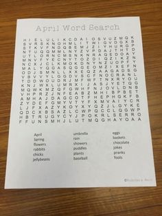 the word search is displayed on top of a wooden table