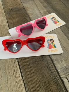 "Show your kids just how bright God's love is with these fun and stylish pink and red sunglasses! A perfect party favor, these sunglasses have a tag that reads \"God's love is so bright.\" The bright colors of these sunglasses make them a fun reminder of God's love and make a great stocking stuffer. Made of Polycarbonate  Size:  Length 1.35\" X Width 5.604\" X Height 1.653\" Visit our shop to see all our fun prayer tools designed to keep your child's faith alive and active. From Catholic stickers to Mass activity bags, we have you covered: www.etsy.com/shop/YourEverydayFaith  All our items are made with the utmost care and love using high quality materials. Items are created in a smoke and pet free environment and shipped, usually within 24 to 48 hours, from Trumbull, CT. Please note howev Mass Activities, Catholic Easter, Birthday Favors Kids, Catholic Christmas, Activity Bags, Kids Easter Basket, Red Sunglasses, Easter Basket Fillers, Easter Gifts For Kids