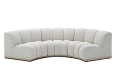 the curved sectional sofa is made from white fabric