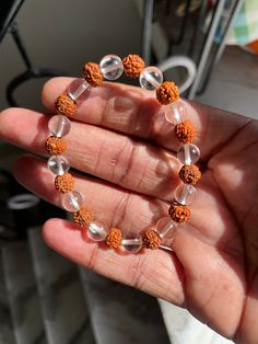 This is Beautifully Designed Bracelet in Natural Clear Crystal Quartz And Rudraksha  Round Shape Uses - Perfect For Your Loved Ones , Perfect Gift ,Etc... Delivery details: ✓ Free Shipping    With safe Packing ✓   Your most welcome Here ❤️ We Design Our All Products in Natural Stones With Perfections And Artmanship Our all Products Are Purely HandCarved with Hand Machine tools Feel Free To  Ask Any Query of Yours We Definitely Reply With our Best ❤️ -                                                                                                           Shyam Gem Carvings Thanks for visiting the shop have a nice day Shyam Gem Carvings ✓ File Decoration, File Decoration Ideas, Crystal Meditation, Latest Bracelets, Meditation Beads, Machine Tools, Clear Quartz Crystal, Crystal Quartz, Beads Bracelet