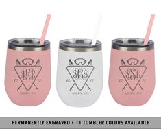 three personalized tumblers with monogrammed logos and straws on them are shown