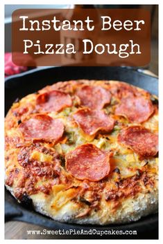 a pepperoni pizza sitting on top of a pan with the words instant beer pizza dough