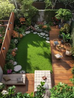 an aerial view of a small backyard garden with grass and flowers on the decking area